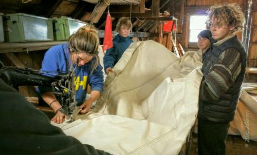 Ashling, Polina, Liz and Kimba seam the outer jib